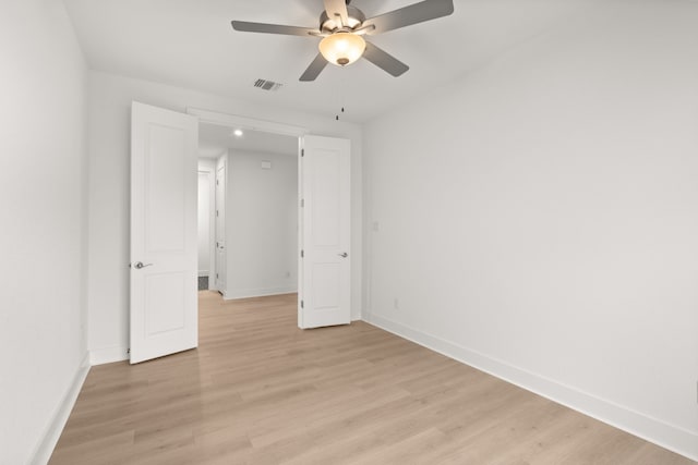 unfurnished bedroom with light wood-type flooring and ceiling fan