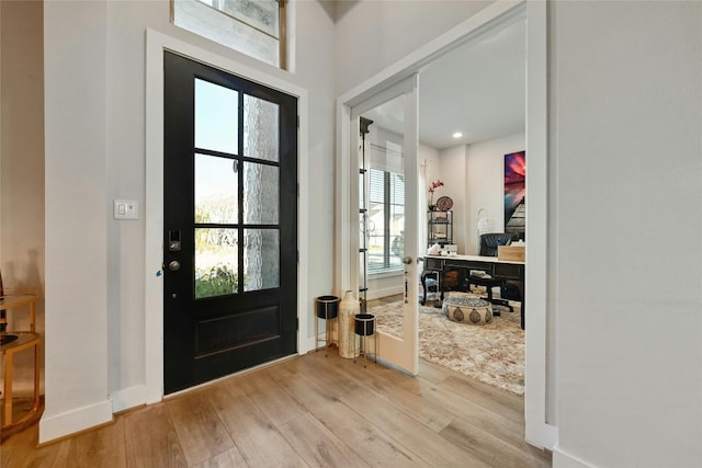 foyer entrance featuring light hardwood / wood-style flooring