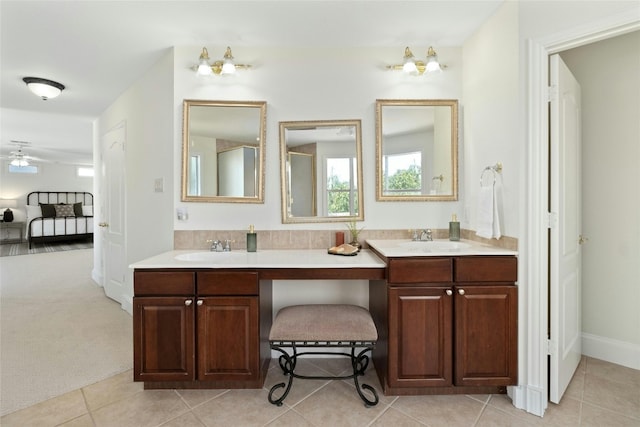 bathroom with vanity, ceiling fan, and tile patterned floors