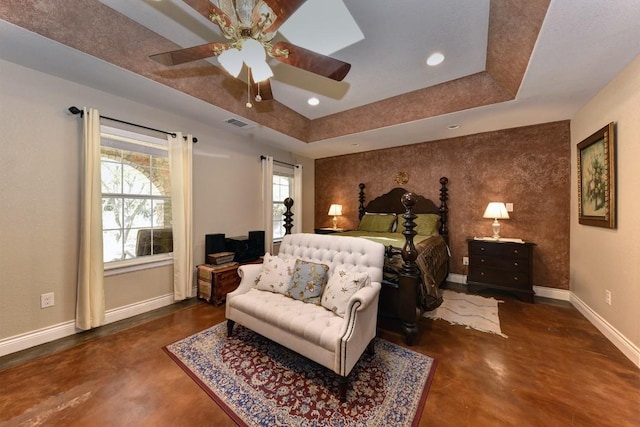 4525 Bell Springs Rd, Dripping Springs, TX 78620 - bedroom featuring finished concrete flooring, a tray ceiling, visible vents, recessed lighting, and baseboards