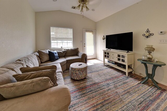 4525 Bell Springs Rd, Dripping Springs, TX 78620 - living room with lofted ceiling, visible vents, and ceiling fan