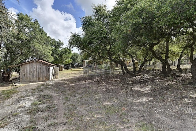 4525 Bell Springs Rd, Dripping Springs, TX 78620 - view of yard featuring an outbuilding