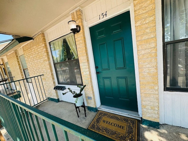 1624 Aquarena Springs Dr Unit G154, San Marcos, TX 78666 - property entrance featuring brick siding and a porch