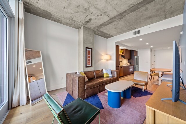 living room with hardwood / wood-style floors