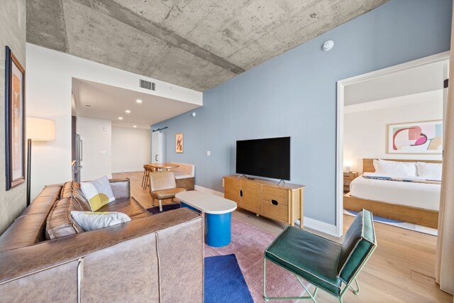 living room with wood-type flooring