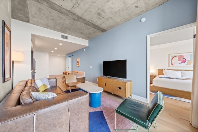 48 E Ave Unit 2511, Austin, TX 78701 - living area with wood finished floors and baseboards