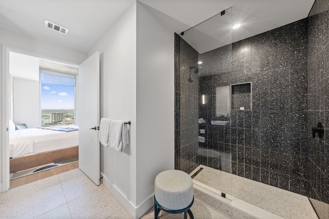 48 E Ave Unit 2511, Austin, TX 78701 - ensuite bathroom featuring walk in shower, baseboards, and recessed lighting