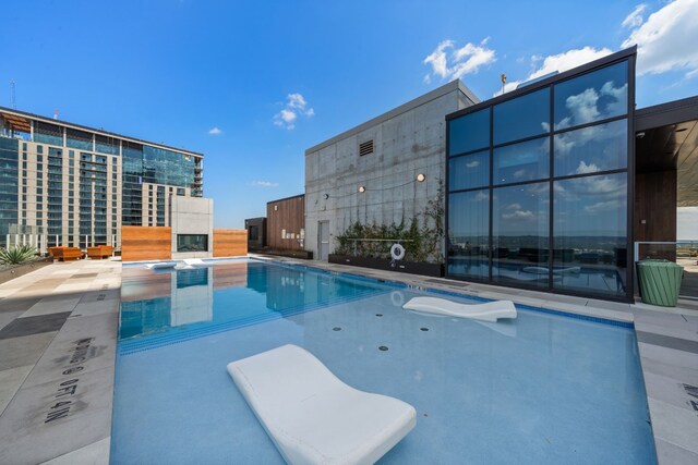 view of pool with a patio area