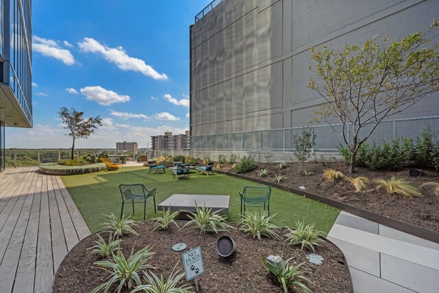 48 E Ave Unit 2511, Austin, TX 78701 - view of grassy yard with a wooden deck