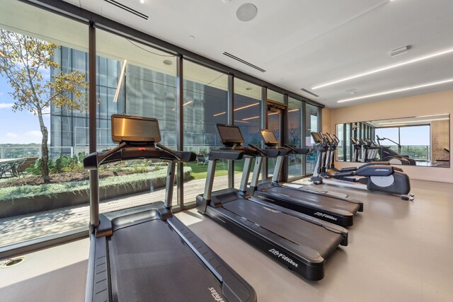 exercise room with a wall of windows