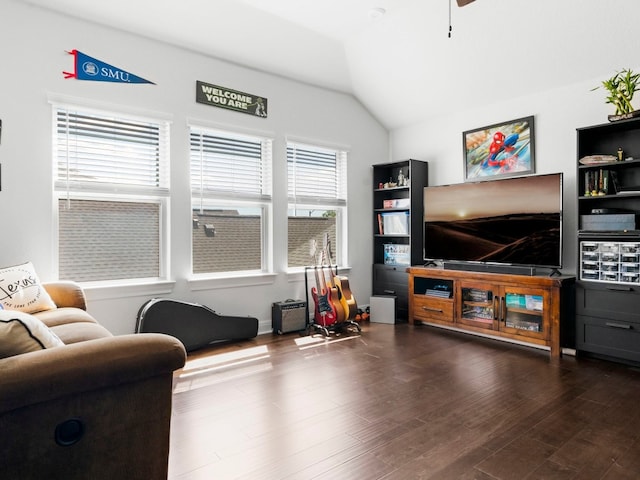 living room with dark hardwood / wood-style floors and vaulted ceiling