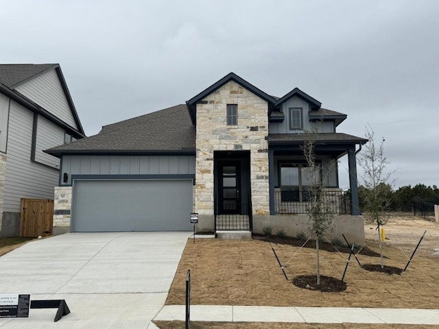 view of front of property with a garage