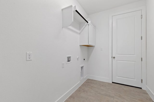 washroom with cabinet space, baseboards, gas dryer hookup, washer hookup, and electric dryer hookup