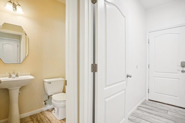 17006 Brewer Blackbird Dr, Pflugerville, TX 78660 - half bath with toilet and wood finished floors