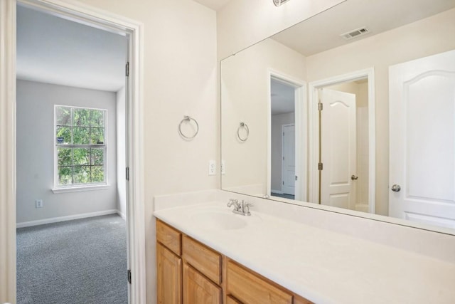 17006 Brewer Blackbird Dr, Pflugerville, TX 78660 - bathroom with vanity and baseboards