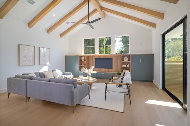 living room with beam ceiling, high vaulted ceiling, and light hardwood / wood-style floors