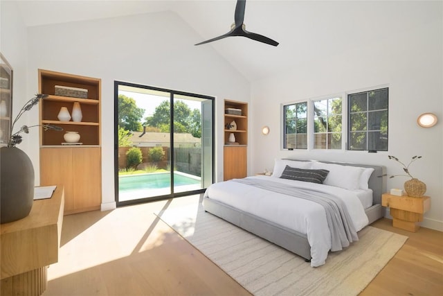 bedroom with access to outside, high vaulted ceiling, ceiling fan, and light wood-type flooring