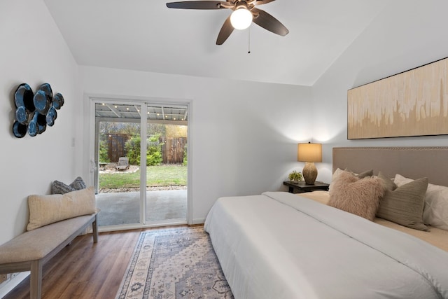 bedroom with access to exterior, ceiling fan, dark hardwood / wood-style floors, and lofted ceiling