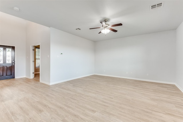 unfurnished room with light hardwood / wood-style floors and ceiling fan