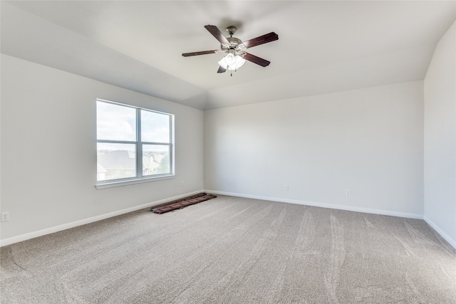 unfurnished room with ceiling fan and carpet floors