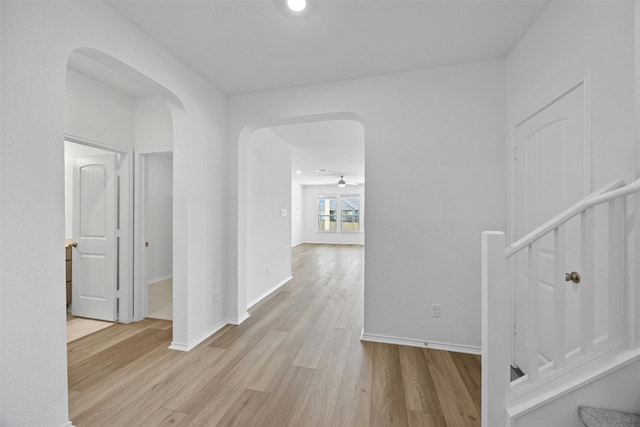 hall with light hardwood / wood-style floors