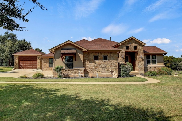 view of front of house featuring a garage and a front lawn