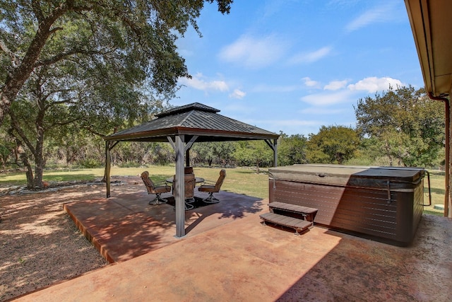 view of patio with a gazebo and a hot tub