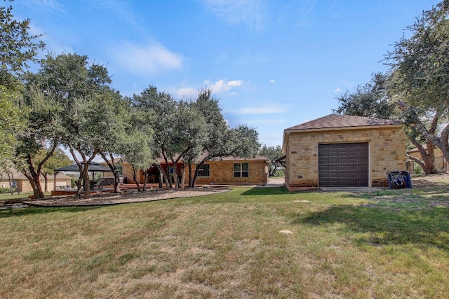 view of yard with a garage