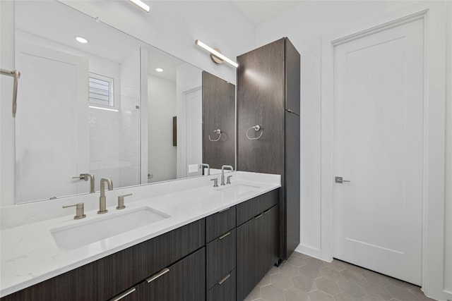 bathroom featuring vanity, toilet, tile patterned floors, and a shower with shower door