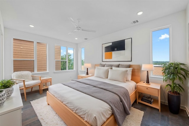 bedroom with dark wood-type flooring and ceiling fan