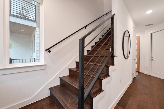 6821 Wolfcreek Pass Unit 12, Austin, TX 78749 - staircase with wood finished floors and baseboards