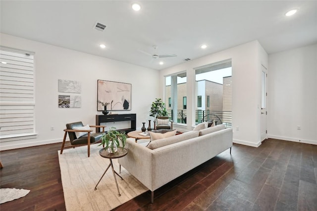 6821 Wolfcreek Pass Unit 12, Austin, TX 78749 - living area featuring dark wood-style flooring, ceiling fan, and recessed lighting