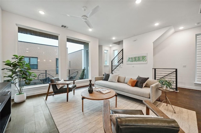 6821 Wolfcreek Pass Unit 12, Austin, TX 78749 - living room featuring a ceiling fan, wood-type flooring, baseboards, and recessed lighting
