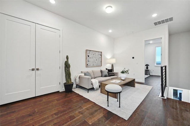 6821 Wolfcreek Pass Unit 12, Austin, TX 78749 - living room with dark wood-style floors, recessed lighting, and baseboards