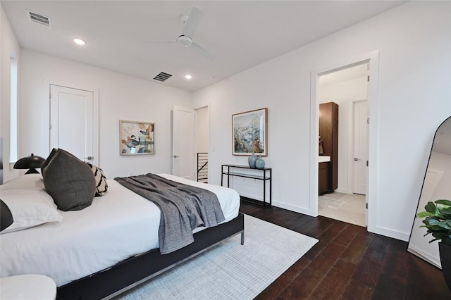 6821 Wolfcreek Pass Unit 12, Austin, TX 78749 - bedroom featuring wood finished floors, recessed lighting, baseboards, a ceiling fan, and ensuite bath