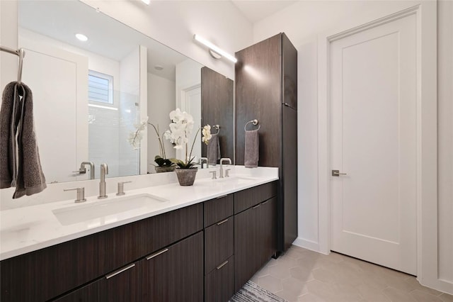 6821 Wolfcreek Pass Unit 12, Austin, TX 78749 - full bath with double vanity and tile patterned flooring