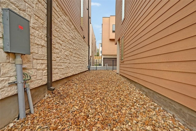 6821 Wolfcreek Pass Unit 12, Austin, TX 78749 - view of side of home with stone siding