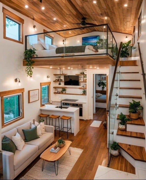 living room with ceiling fan, sink, hardwood / wood-style floors, and wooden ceiling