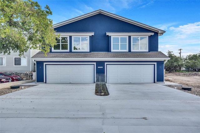 view of front of house with a garage