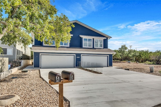 view of front of home with a garage