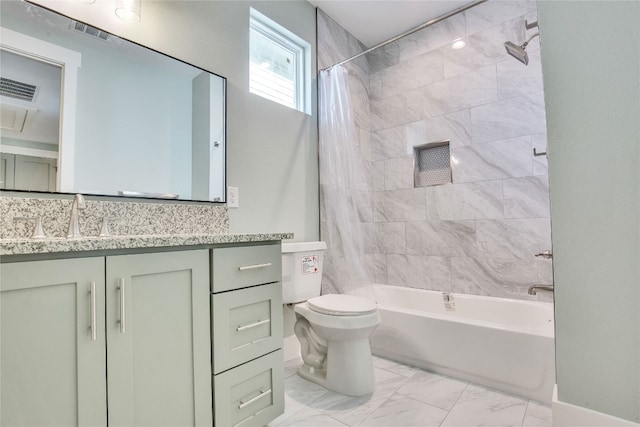 full bathroom featuring shower / tub combo, vanity, and toilet