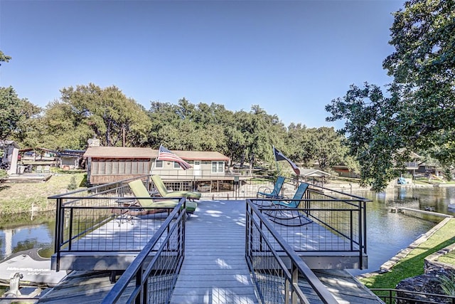 1104 Hill Circle W Dr, Granite Shoals, TX 78654 - dock area featuring a deck with water view and view of wooded area