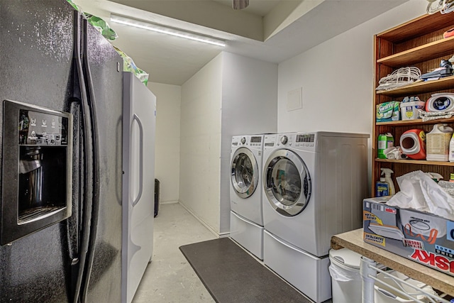 laundry room featuring washer and clothes dryer