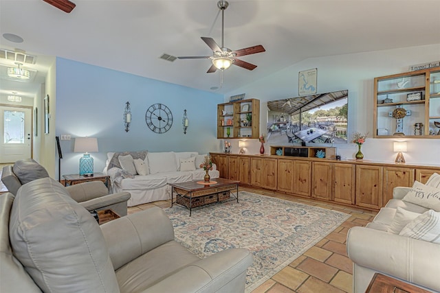 living room with vaulted ceiling and ceiling fan