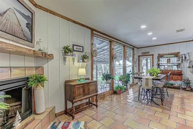 1104 Hill Circle W Dr, Granite Shoals, TX 78654 - dining space with crown molding, recessed lighting, and a fireplace