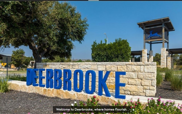 view of community sign