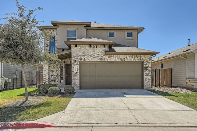 view of front of property featuring a garage