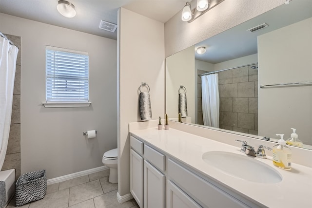 bathroom featuring a shower with curtain, vanity, toilet, and tile patterned floors