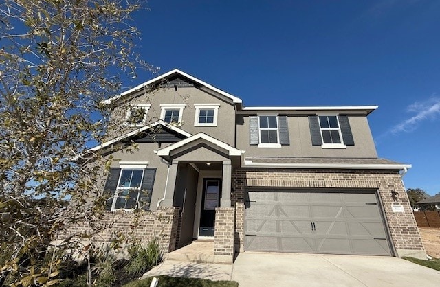 craftsman house featuring a garage