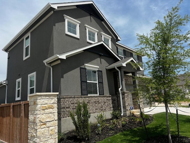 552 Raleigh Dr, Georgetown, TX 78633 - view of front facade with stucco siding and stone siding